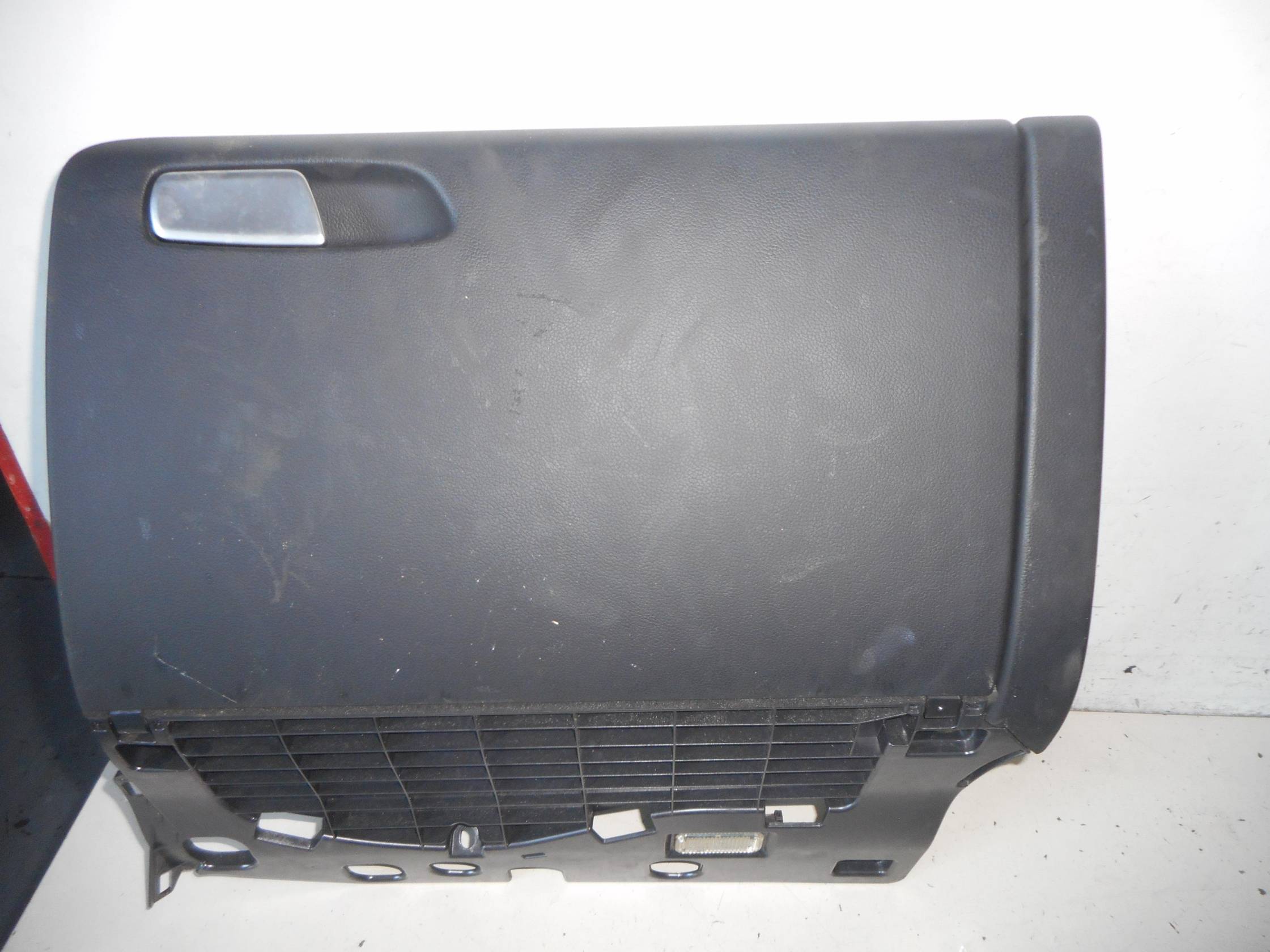 Portaoggetti cruscotto dx.